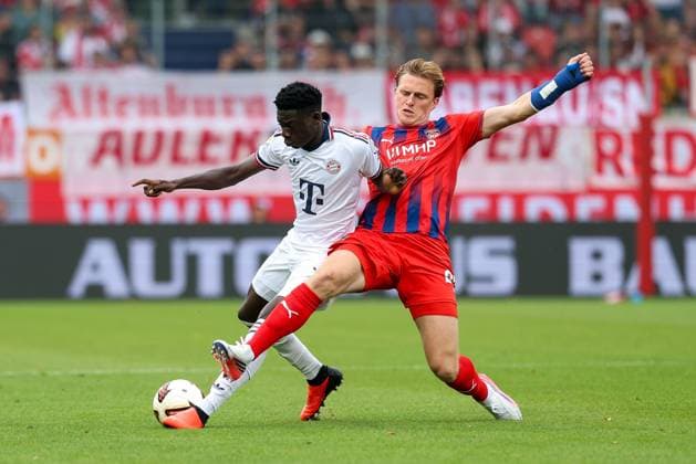 One-on-one, action, with Bara Ndiaye 39 FC Bayern Munich, Mikkel Kaufmann 29, 1 FC Heidenheim, 1 FC Heidenheim 1846 vs. FC Bayern Munich, soccer, friendly match, August 18, 2026, Heidenheim, Baden-Württemberg, Germany Copyright: xkolbert-press ChristianxKolbertx