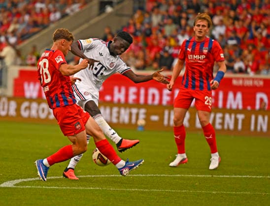 August 18, 2026, 2026–2027 Bundesliga, Friendly Match, 1. FC Heidenheim vs. FC Bayern Munich, at the Voith Arena in Heidenheim, Bara Sapoko Ndiaye (Bayern Munich) vs. Yannik Wagner (1. FC Heidenheim)