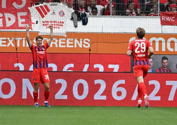 August 18, 2026, xsltx, soccer friendly, 1 FC Heidenheim vs. FC Bayern Munich – Yannik Wagner of 1 FC Heidenheim 1846 scores to make it 1–0, the first to congratulate him is Mikkel Kaufmann, 1 FC Heidenheim 1846. DFL and DFB regulations prohibit any use of photographs as image sequences and or quasi-video.