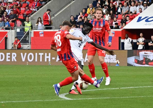 August 18, 2026, xsltx, soccer exhibition match, 1 FC Heidenheim vs. FC Bayern Munich, Yannik Wagner 1 FC Heidenheim 1846, Bara Sapoko Ndiaye FC Bayern Munich. DFL and DFB regulations prohibit any use of photographs as image sequences and or quasi-video.