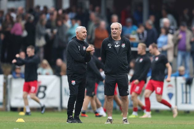 August 18, 2026, Men s Soccer, 2026–2027 Season, Bavarian Regional League, Matchday 5: TSV Aubstadt vs. TSV 1860 Munich; from left: Claudiu Bozesan, Head Coach, TSV Aubstadt, and Günter Schirling, Head of the Soccer Department, TSV Aubstadt; Sulzfeld School Stadium, Aubstadt; NGN Arena, Bavaria, Germany