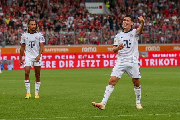Felipe Chavez, 32, of FC Bayern Munich celebrates his goal to tie the game at 1-1, sharing the joy with Sascha Boey, 23, of FC Bayern Munich, 1 FC Heidenheim 1846 vs. FC Bayern Munich, soccer, men’s, Bundesliga, friendly match, 2026–2027 season, August 18, 2026. DFB regulations prohibit any use of photographs as image sequences and or quasi-video. Heidenheim, Baden-Württemberg, Germany Copyright: xkolbert-press MartinxAgüerax