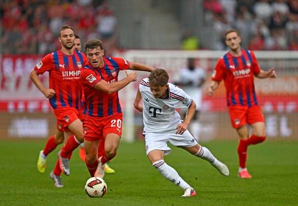 August 18, 2026, 2026–2027 Bundesliga, Friendly Match, 1. FC Heidenheim vs. FC Bayern Munich, at the Voith Arena in Heidenheim; from left: Luca Kerber (1. FC Heidenheim 1846) and Tim Binder (FC Bayern Munich)