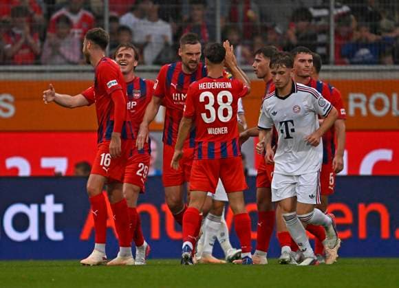 August 18, 2026, 2026–2027 Bundesliga, Friendly Match, 1. FC Heidenheim vs. FC Bayern Munich, at the Voith Arena in Heidenheim; from left: Julian Niehues (1. FC Heidenheim 1846) and Mikkel Kaufmann (1. FC Heidenheim 1846) celebrate after the 2–1 victory