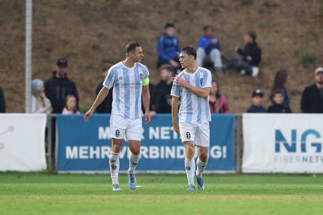 August 18, 2026, Men s Soccer, 2026–2027 Season, Bavarian Regional League, Matchday 5: TSV Aubstadt vs. TSV 1860 Munich; from left: Dennis Dressel 14, TSV 1860 Munich and Emre Erdogan 19, TSV 1860 Munich after the 0–2 loss at Sulzfeld Schulstadion, Aubstadt, NGN Arena, Bavaria, Germany