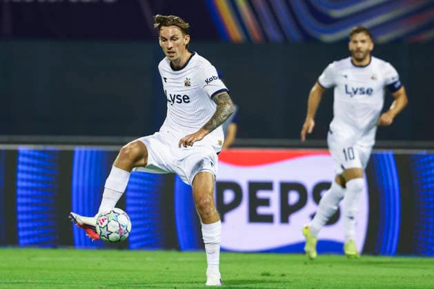 Zagreb, August 18, 2026: Kristoffer Askildsen of the Vikings with the ball and Zlatko Tripic of the Vikings during the Champions League qualifying playoff match between Dinamo Zagreb and the Vikings at Maksimir Stadium. Photo by Nikola Krstic, NTB. EDITORIAL USE ONLY. RESTRICTED USE FOR BETTING COMPANIES.  Copyright: xNTBx