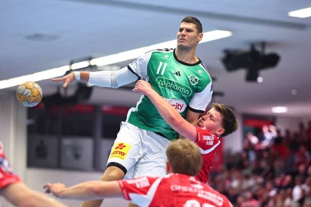Sebastian Heymann, TSV Hannover Burgdorf, No. 11 in a one-on-one battle with GER, TuS Ferndorf vs. TSV Hannover Burgdorf, Handball, DHB Cup, 1st Round, 2026–2027 Season, August 21, 2026, GER, TuS Ferndorf vs. TSV Hannover Burgdorf, Handball, DHB Cup, Round 1, 2026–2027 season, August 21, 2026, Kreuztal Copyright: xEibner-Pressefoto RenexWeissx EP_RWS