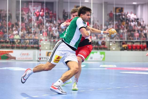 Renars Uscins (TSV Hannover Burgdorf), No. 10, in a one-on-one battle with Mattis Michel (TuS Ferndorf), No. 17, GER, TuS Ferndorf vs. TSV Hannover Burgdorf, handball, DHB Cup, 1st round, 2026–2027 season, August 21, 2026 GER, TuS Ferndorf vs. TSV Hannover Burgdorf, Handball, DHB Cup, Round 1, 2026–2027 season, August 21, 2026 Kreuztal Copyright: xEibner-Pressefoto RenexWeissx EP_RWS