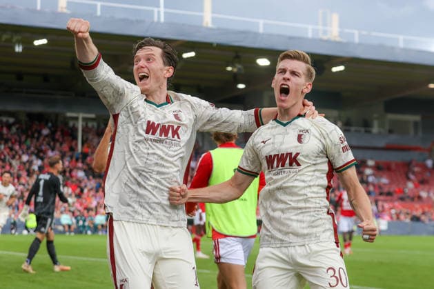 August 22, 2026, xtgx, Soccer DFB Cup 1st Round Energie Cottbus vs. FC Augsburg emspor, from left: Celebrations after Anton Kade’s 0–1 goal for Augsburg, 30 DFL DFB REGULATIONS PROHIBIT ANY USE OF PHOTOGRAPHS AS IMAGE SEQUENCES AND OR QUASI-VIDEO Cottbus