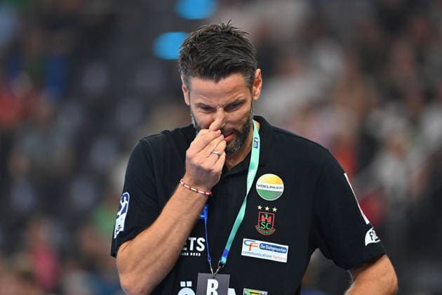 Coach Bennet WIEGERT, SC Magdeburg—disappointed, frustrated, dejected—single frame, cropped shot, half-length portrait, 2026 Men’s Handball Rexel Super Cup: SC Magdeburg vs. Füchse Berlin 38–30 on August 22, 2026, at SAP Garden, Munich