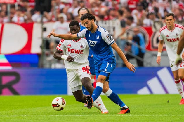 A duel between Ragnar Ache (1. FC Köln, 09) and Leon Avdullahu (TSG Hoffenheim, 07) for the ball; 1. FC Köln vs. TSG Hoffenheim, Soccer, Bundesliga, Matchday 1, 2026–27 season, August 29, 2026, DFL regulations prohibit any use of photographs as image sequences and or quasi-video. 1 FC Köln vs. TSG Hoffenheim, Soccer, Bundesliga, Matchday 1, 2026–27 season, August 29, 2026, Cologne Copyright: xEibner-Pressefoto LukasxBaldygax EP_LBA