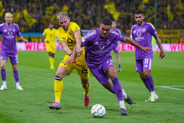 September 1, 2026, xydrx, soccer, DFB Cup, HEBC Hamburg vs. Borussia Dortmund, 2026–2027 season, Volksparkstadion, Julian Ryerson (Borussia Dortmund), 26 in a tackle against Lionel von Zitzewitz (HEBC Hamburg), 27. DFB regulations prohibit any use of photographs as image sequences and or quasi-video. Copyright: HMBxMedia YannisxDreimann