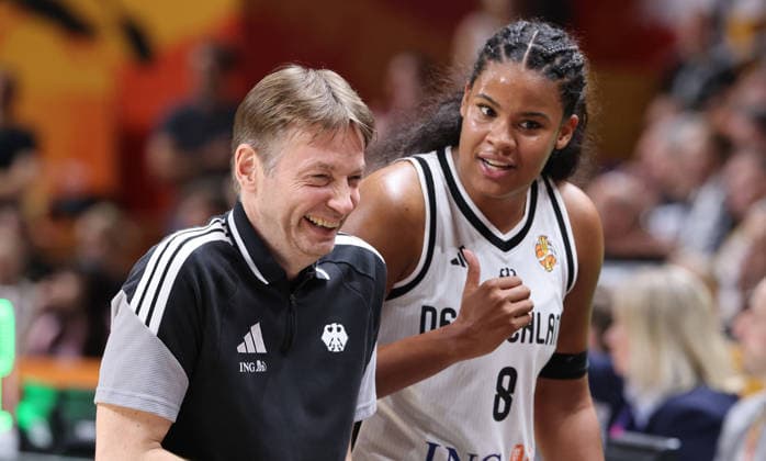National Team Coach Olaf Lange laughs with Nyara Sabally; Upper Body; Sports; Basketball; FIBA World Cup; Women s World Championship; 2026-2027 Season; August 9, 2026; DBB; Germany (GER) vs. South Korea (KOR)