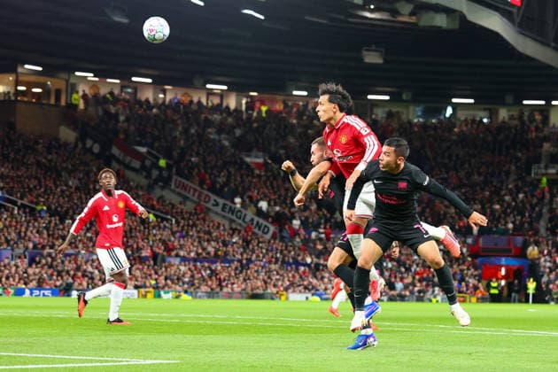 RECORD DATE NOT STATED 10th September 2026; Old Trafford, Manchester, England; UEFA Champions League Football, Manchester United, ManU versus Sabah; Lisandro Martinez of Manchester United beats Umarali Rakhmonaliev of Sabah FK to the high ball in the air RogerxEvans