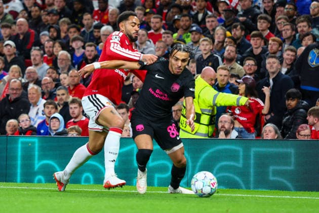 RECORD DATE NOT STATED 10th September 2026; Old Trafford, Manchester, England; UEFA Champions League Football, Manchester United, ManU versus Sabah; Rodrigo Fernandes of Sabah FK under pressure from Matheus Cunha of Manchester United RogerxEvans