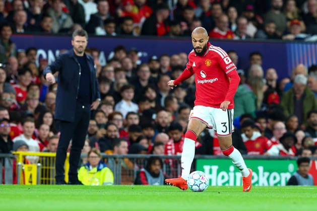 RECORD DATE NOT STATED 10th September 2026; Old Trafford, Manchester, England; UEFA Champions League Football, Manchester United, ManU versus Sabah; Noussair Mazraoui of Manchester United watched by Manchester United manager Michael Carrick RogerxEvans