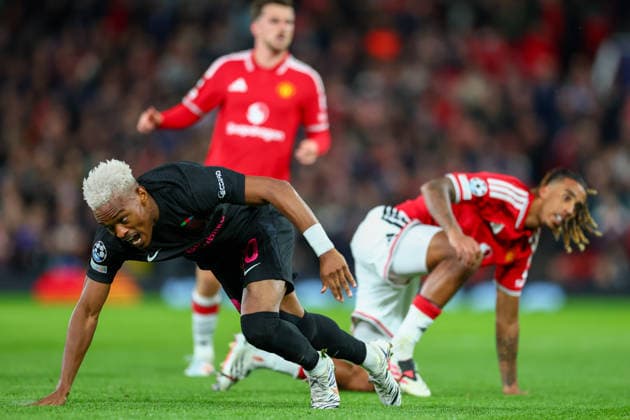 RECORD DATE NOT STATED 10th September 2026; Old Trafford, Manchester, England; UEFA Champions League Football, Manchester United, ManU versus Sabah; Joy-Lance Mickels of Sabah FK goes down under pressure from Leny Yoro of Manchester United RogerxEvans