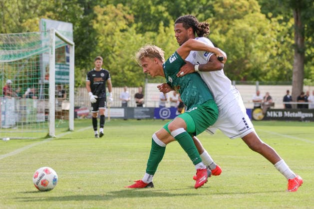 September 12, 2026, Soccer, Men s, Bavarian Regional League, 2026–2027 Season, Matchday 8: VfB Eichstätt vs. FC Schweinfurt 05. From left: Elias Herger (VfB Eichstätt), No. 11, against Morris Adelabu (FC Schweinfurt 05), No. 27. Eichstätt Hirsch Sportpark, Bavaria, Germany