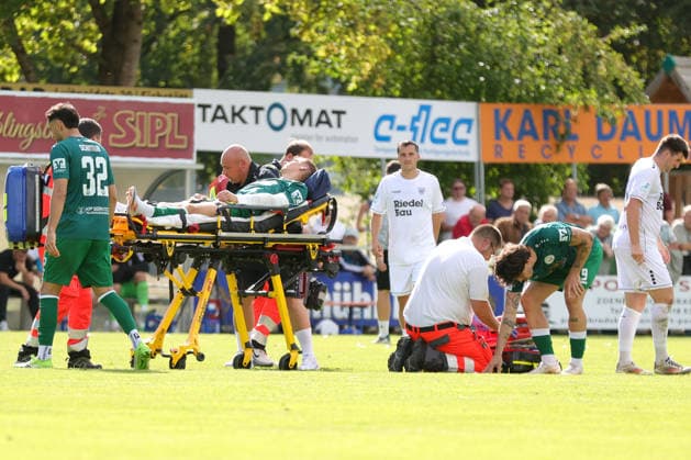 September 12, 2026, Soccer, Men s, Bavarian Regional League, 2026–2027 Season, Matchday 8: VfB Eichstätt vs. FC Schweinfurt 05. Injured VfB Eichstätt player Daniel Hofrichter (No. 08) is carried off the field at Hirsch Sportpark in Eichstätt, Bavaria, Germany