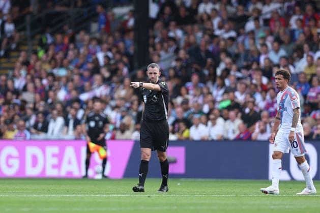 12th September 2026; Selhurst Park, London, England; Premier League Football, Crystal Palace versus Ipswich Town; referee Christopher Kavanagh points to the centre circle to confirm a goal after a VAR review for possible offside after Emersonn of Ipswich Town goal in the 23rd minute KatiexChan