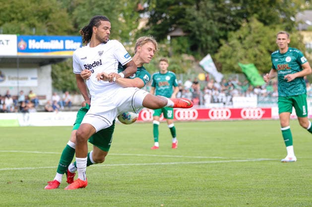 September 12, 2026, Soccer, Men s, Bavarian Regional League, 2026–2027 Season, Matchday 8: VfB Eichstätt vs. FC Schweinfurt 05. From left: Elias Herger (VfB Eichstätt, No. 11) against Morris Adelabu (FC Schweinfurt 05, No. 27). Eichstätt Hirsch Sportpark, Bavaria, Germany