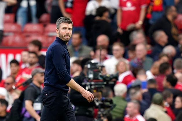 Manchester, England, 13th September 2026. Michael Carrick manager of Manchester United, ManU looks on dejected at the final whistle during the Manchester United vs Manchester City Premier League match at Old Trafford, Manchester. Picture credit should read: Andrew Yates Sportimage EDITORIAL USE ONLY. No use with unauthorised audio, video, data, fixture lists, club league logos or live services. Online in-match use limited to 120 images, no video emulation. No use in betting, games or single club league player publications. SPI_091_AY_MAN_UTD_MAN_CITY SPI-4993-0084