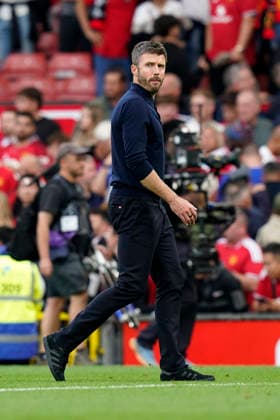 Manchester, England, 13th September 2026. Michael Carrick manager of Manchester United, ManU looks on dejected at the final whistle during the Manchester United vs Manchester City Premier League match at Old Trafford, Manchester. Picture credit should read: Andrew Yates Sportimage EDITORIAL USE ONLY. No use with unauthorised audio, video, data, fixture lists, club league logos or live services. Online in-match use limited to 120 images, no video emulation. No use in betting, games or single club league player publications. SPI_092_AY_MAN_UTD_MAN_CITY SPI-4993-0085