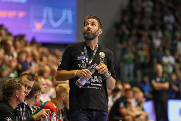 September 13, 2026, xgox, Handball: Opel HBL SC Magdeburg vs. HSG Wetzlar emspor, from left: Bennet Wiegert (Magdeburg), the coach looking pensive (Magdeburg)
