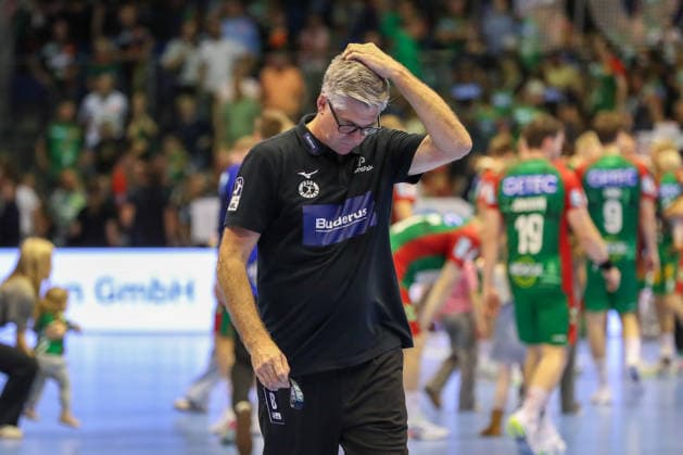 September 13, 2026, xgox, Handball Opel HBL SC Magdeburg vs. HSG Wetzlar, from left: Runar Sigtryggsson (Wetzlar), coach looks disappointed, looks dejected, looks downcast, looks disappointed (Magdeburg)