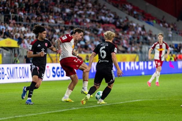 September 15, 2026, Soccer, GER, Season, 3rd Division, 2026–2027 Season, Matchday 6, SSV Jahn Regensburg vs. Fortuna Düsseldorf: Adrian Fein (Regensburg) vs. Anas Slimani (Düsseldorf) and Andreas Müller (Düsseldorf). DFL REGULATIONS PROHIBIT ANY USE OF PHOTOGRAPHS AS IMAGE SEQUENCES AND OR QUASI-VIDEO