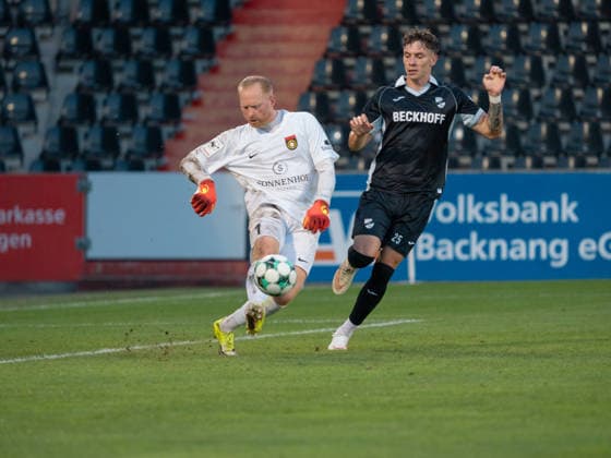 Goalkeeper Maximilian Reule of SG Sonnenhof Grossaspach, No. 01, clears the ball past Tim Heike of SC Verl, No. 25, GER, Soccer, SG Sonnenhof Grossaspach vs. SC Verl, 3rd League, Matchday 6, Aspach, 2026–2027 season, September 15, 2026 GER, Soccer, SG Sonnenhof Grossaspach vs. SC Verl, 3rd Division, Matchday 6, 2026–2027 season, September 15, 2026, Aspach Copyright: xCarstenxSchweringx EP_CSG