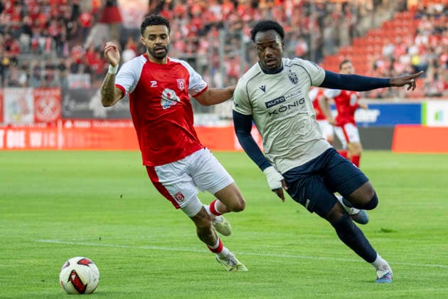 Regionalliga Northeast, Season 26-27: Hallescher FC vs. FC Carl Zeiss Jena, Halle, Germany, September 15, 2026. Pictured, from left: Stanley Ratifo (Halle) and Miguel Boog (Jena). Halle-Saale Leuna Chemie Stadium, Saxony-Anhalt, Germany