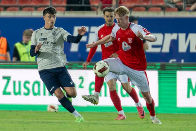 Regionalliga Nordost, Season 26–27: Hallescher FC vs. FC Carl Zeiss Jena, Halle, Germany, September 15, 2026. Pictured: Dion Ajvazi (Jena), Max Kulke (Halle), and Lennard Becker (Halle). Halle Saale Leuna Chemie Stadium, Saxony-Anhalt, Germany
