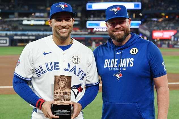 September 15, 2026, Toronto, On, Canada: Toronto Blue Jays George Springer, left, receives the Roberto Clemente nominee award from manager John Schneider prior to the team taking on the Detroit Tigers in MLB, Baseball Herren, USA baseball action in Toronto on Tuesday, Sept. 15, 2026. Canada News - September 15, 2026  - ZUMAc35_ 20260915_zaf_c35_101 Copyright: xJonxBlackerx