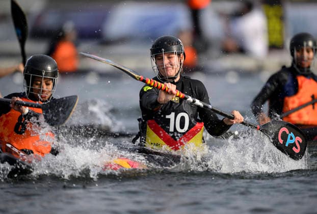 GRUENEWALD, KATHARIN (GER) battling for the ball against MUSTAPA, SITI NURQASRINA SYAHZANANI (Malaysia), action, tackle—Women’s Malaysia vs. Germany 0–14, on September 16, 2026, at the Canoe Polo World Championships held from September 15 to September 20, 2026, at the Duisburg Regatta Course in Germany