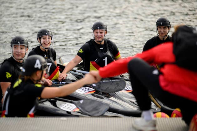 Team Germany together before the game, team huddle, from left to right: KUNZ, HANNAH GER, CRAMER, NELE GER, SALIOU, LAURA GER, RUTZEN, JILL LARA GER; Women’s Malaysia vs. Germany 0–14, on September 16, 2026, at the Canoe Polo World Championships held from September 15 to September 20, 2026, at the Duisburg Regatta Course in Germany