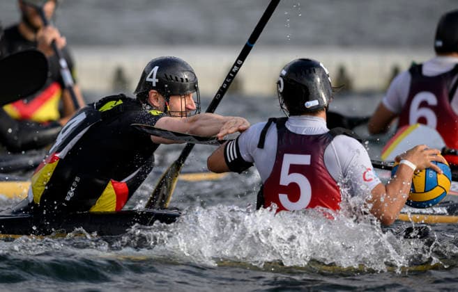 l r KMIEC, JEREMY GER battles KIMURA, RYOTA JPN for the ball; action; men s match: Germany vs. Japan 7–0, on September 16, 2026, at the Canoe Polo World Championships held from September 15 to September 20, 2026, at the Duisburg Regatta Course in Germany