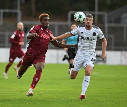 September 16, 2026, xophax, Soccer 3rd Division, Fortuna Cologne vs. SV Wehen Wiesbaden; on the left: Romeo Aigbekaen (Fortuna Cologne) and Jordy Steven Gillekens (SV Wehen Wiesbaden); on the right: Cologne