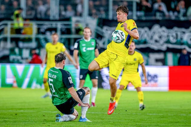 September 16, 2026, xkwix, Soccer, 3rd Division, Preußen Münster 1 vs. FC Saarbrücken, Preußenstadion, Matchday 6, 2026–2027 Season: Lucas Zeller of Preußen Münster (5) in a tackle against Alexander Staff of 1. FC Saarbrücken (29). DFB regulations prohibit any use of photographs as image sequences and or quasi-video. Photo: xKamilxWilkowskixPressefotoKochx, North Rhine-Westphalia, Germany