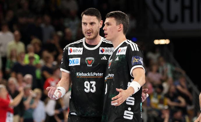 Mijajlo Marsenic talks with Frederik Simak: Upper Body Workout, Handball, Champions League, Men s Champions League, Matchday 2, 2026–2027 Season, September 16, 2026, Füchse Berlin vs. One Veszprem HC at the Max Schmeling Halle