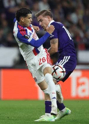 Lyon s Kail Boudache and Anderlecht s Marten Winkler fight for the ball during a soccer game between Belgian RSC Anderlecht and French Olympique Lyonnais, Wednesday 16 September 2026 in Brussels, on the first day (out of 8) of the league phase of the UEFA Europa League tournament. VIRGINIExLEFOUR  x186659143x