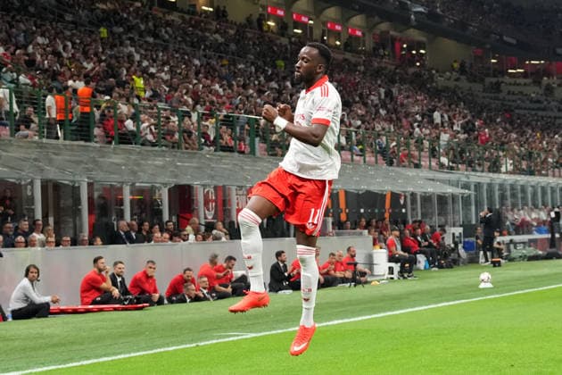 Benfica s Dode Lukebakio celebrates after scoring 0-1 during the Europa League soccer match between Ac Milan and Benfica at San Siro Stadium in Milan , Italy - September 16 , 2026. - Soccer  Copyright: xSpada LaPressex