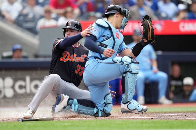 September 16, 2026, Toronto, On, CANADA: Toronto Blue Jays catcher Brandon Valenzuela (59) tries to tag out Detroit Tigers Colt Keith (33) as he scores a run during first inning MLB, Baseball Herren, USA baseball action in Toronto on Wednesday, Sept. 16, 2026. Canada News - September 16, 2026  - ZUMAc35_ 20260916_zaf_c35_111 Copyright: xNathanxDenettex