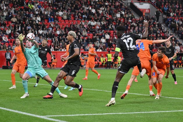 Edmond Tapsoba of Bayer 04 Leverkusen (right) sees his header saved by goalkeeper Zan Luk Leban of NK Celje on September 16, 2026, in a soccer match for the 2026–2027 UEFA Europa League, Matchday 1, Bayer 04 Leverkusen vs. NK Celje. UEFA regulations prohibit any use of photographs as image sequences and or quasi-video. Leverkusen, BayArena, North Rhine-Westphalia, Germany Team2