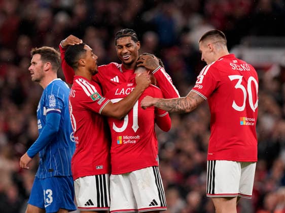 Manchester, England, 16th September 2026. Shea Lacey of Manchester United, ManU celebrates with Marcus Rashford of Manchester United celebrating during the Manchester United vs Brighton and Hove Albion Carabao Cup match at Old Trafford, Manchester. Picture credit should read: Andrew Yates Sportimage EDITORIAL USE ONLY. No use with unauthorised audio, video, data, fixture lists, club league logos or live services. Online in-match use limited to 120 images, no video emulation. No use in betting, games or single club league player publications. SPI_019_AY_MAN_UTD_BRIGHTON SPI-5001-0019