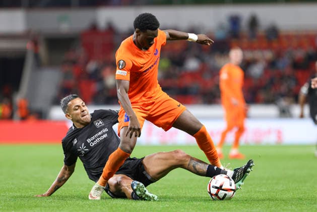 Facundo Medina of Bayer 04 Leverkusen and Yaya Dukuly of NK Celje battle for the ball during the 2026-27 UEFA Europa League group stage match between Bayer 04 Leverkusen and NK Celje at BayArena on September 16, 2026 in Leverkusen, Germany. Photo by Oliver Kaelke, DeFodi Images