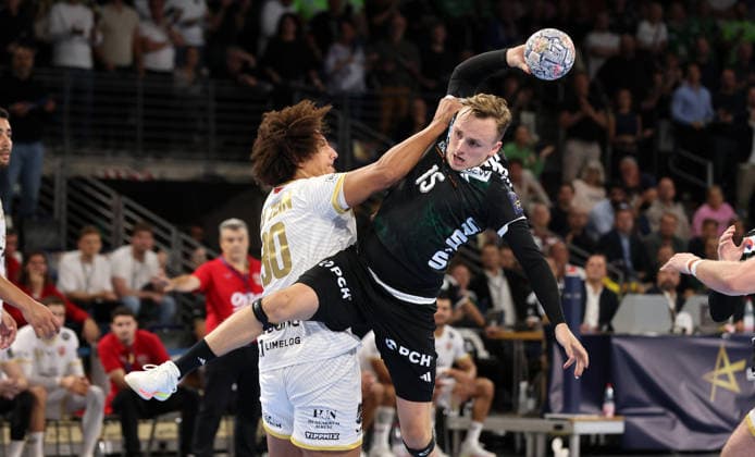 Ali Ismail Zeinelabedin, Tobias Schjoelberg Groendahl with the ball, one-on-one, game scene, action, sports, handball, Champions League, Men s Champions League, Matchday 2, 2026–2027 season, September 16, 2026, Füchse Berlin vs. One Veszprém HC at the Max Schmeling Halle