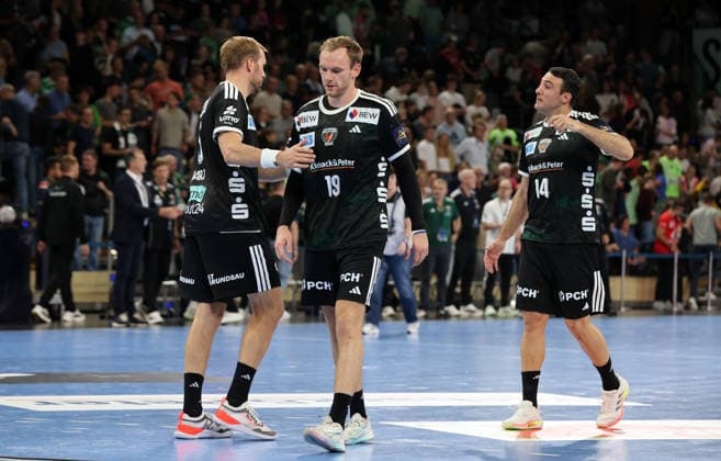 Max Darj, Mathias Gidsel and Aitor Arino disappointed after the game Disappointment Sports Handball Champions League Men s Champions League Matchday 2 2026–2027 Season September 16, 2026 Füchse Berlin vs. One Veszprém HC at the Max Schmeling Halle
