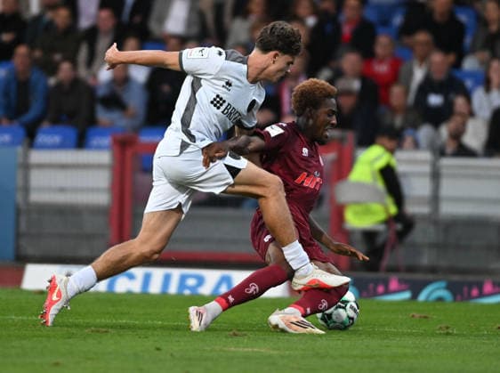 September 16, 2026, xophax, Soccer 3rd Division, Fortuna Cologne vs. SV Wehen Wiesbaden, featuring Max Brandt (Wehen) and Romeo Aigbekaen (Fortuna Cologne)
