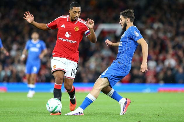 MANCHESTER, ENGLAND, SEPTEMBER 16: Youri Tielemans of Manchester United, ManU (L) is tackled by Jaouen Hadjam of Brighton & Hove Albion (R) during a Carabao Cup Third Round match between Manchester United and Brighton & Hove Albion at the Old Trafford on September 16, 2026 in York, England. (Photo by Zach Forster Sports Press Photo) Copyright: xZachxForster SportsxPressxPhotox Sportspressphoto_SPR233127